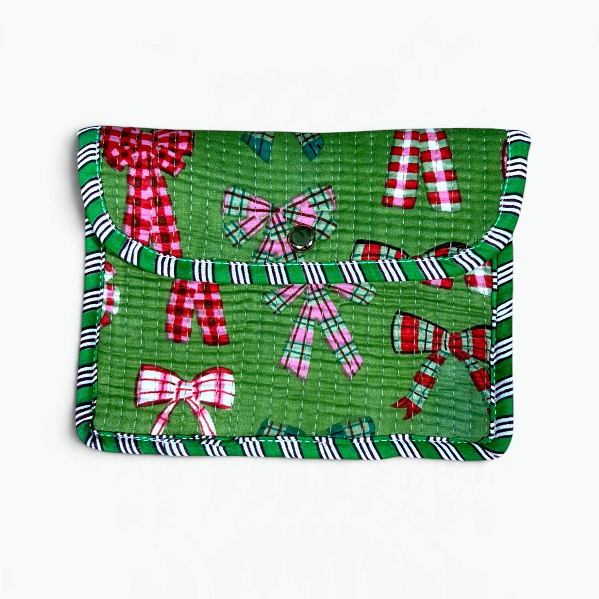 A green quilted fabric pouch featuring a festive holiday print with red and white gingham bows, plaid accents, and striped trim, shown against a plain white background.