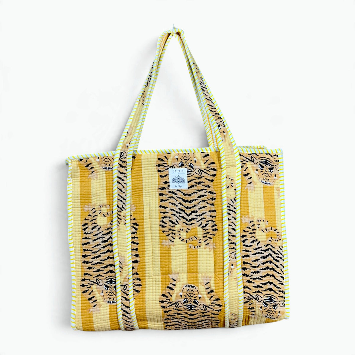 Yellow and mustard striped quilted cotton tote bag with tiger print and yellow and white striped piping and handles