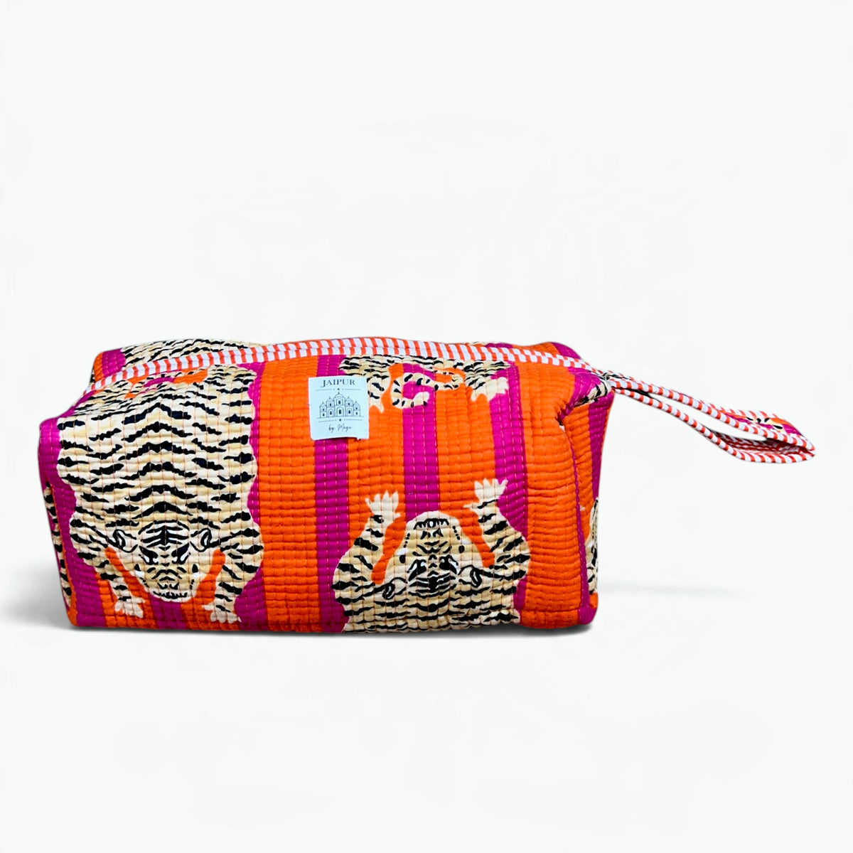Vibrant orange and magenta pink striped quilted cotton wash bag featuring a tiger print, zip closure, and patterned wrist loop.