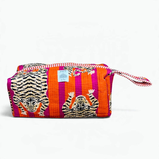 Vibrant orange and magenta pink striped quilted cotton wash bag featuring a tiger print, zip closure, and patterned wrist loop.
