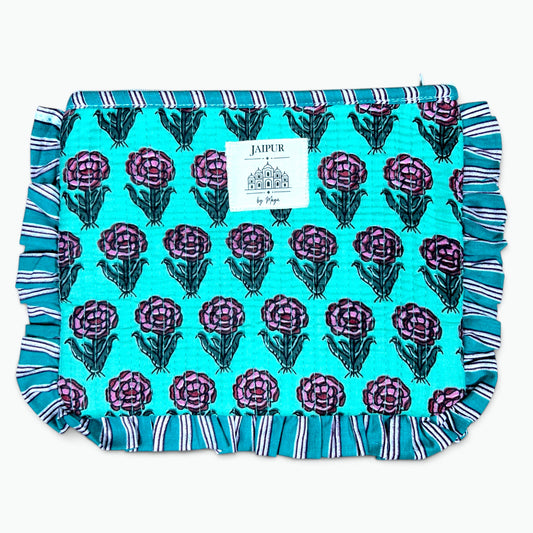 A square cotton muslin fabric item, likely a quilt or blanket, featuring a turquoise background with a repeating pattern of purple and green thistle flowers. The fabric has ruffled edges with blue, white, and purple stripes, and a central white label reading 'JAIPUR by Maya'.